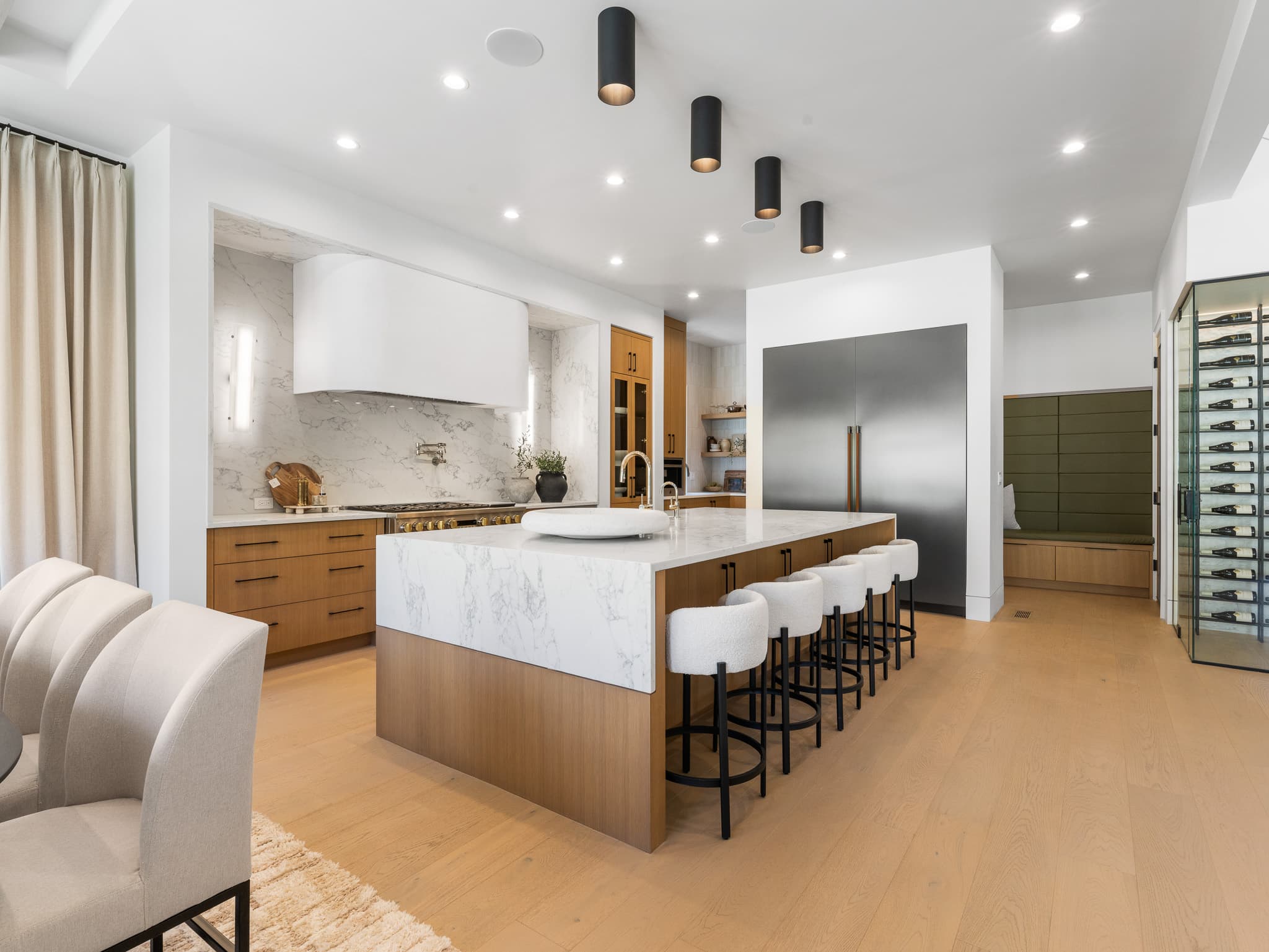 Custom kitchen remodel with stone counters and a tile backsplash by Portland Tile in Portland, OR