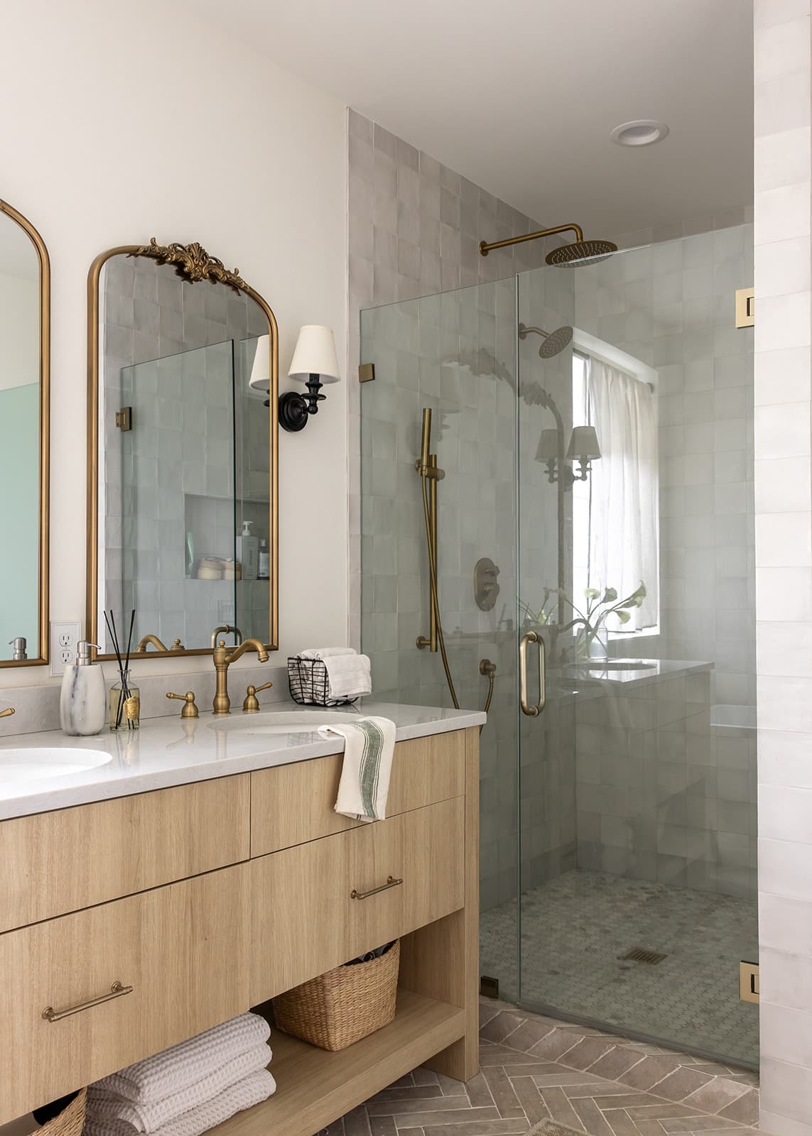 Custom tile primary bathroom remodel with a glass walk in shower by Portland Tile in Portland, OR
