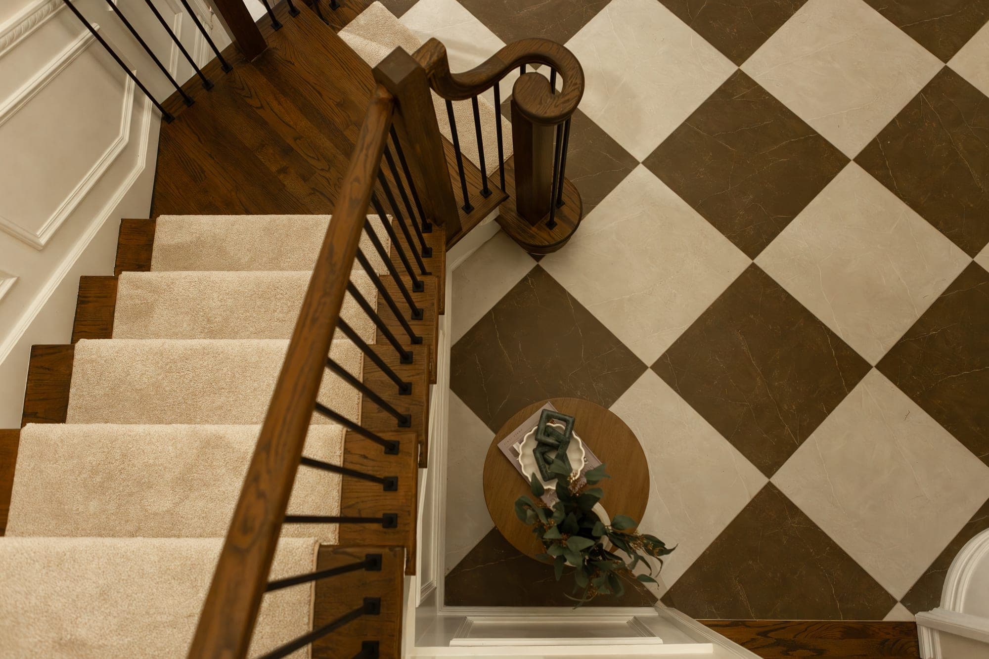 Close up of wide plank hardwood flooring showing the grain and a tight seam by Portland Tile in Portland, OR